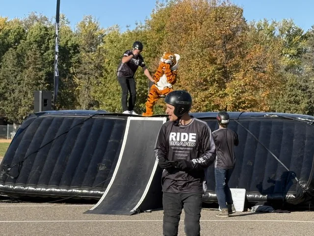 The FES tiger mascot participating in an outdoor school activity